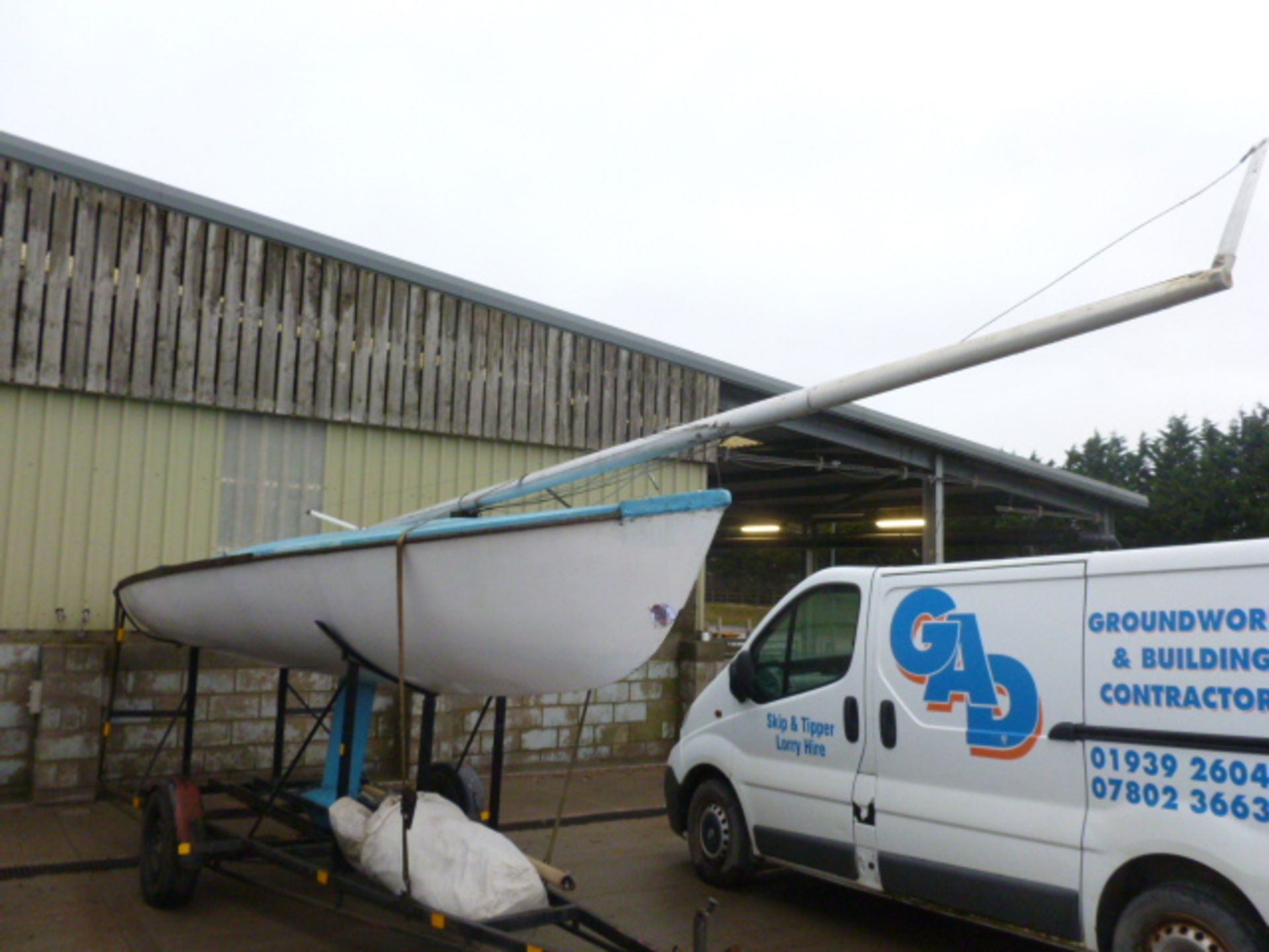 TEMPEST CLASS SAIL BOAT ON TRAILER