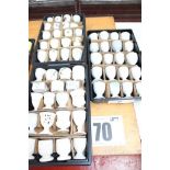 3 TRAYS & CONTENTS TOTALLING 59 OF WHITE & CREAM COLOURED EGG CUPS.