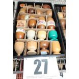 TRAY & CONTENTS OF 21 WOODEN PEDESTAL EGG CUPS & 2 WOODEN EGGS.