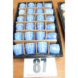 TRAY & CONTENTS OF 24 BLUE & WHITE SOUVENIR TUB EGG CUPS.