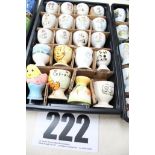 TRAY & CONTENTS OF 20 CHILDRENS PEDESTAL EGG CUPS.