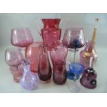 Selection of coloured glassware to include Caithness, Mdina and Antique cranberry glassware