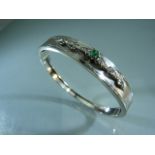 18ct white gold emerald and diamond bangle