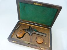 Ladies Muff pistol with retracting hammer, boxed with wooden cap box