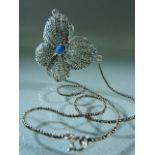 Silver (925) butterfly necklace set with a ruby and central opal