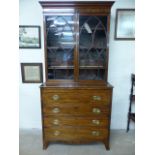 Antique Gothic mahogany secretaire bookcase. The upper doors line with brass. 1 glass pane cracked