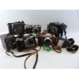 Collection of five vintage cameras to include Praktica, Miranda, Zenith, Kodak Brownie together with