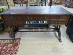 Unusual Partners type desk with drop leaf ends and faux drawers to one side