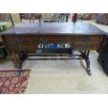 Unusual Partners type desk with drop leaf ends and faux drawers to one side