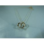 9ct Gold heart shaped pendant on chain.