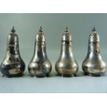 Four hallmarked silver pepperettes. Total approx weight -