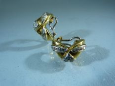 Pair of 18ct yellow gold and diamond earrings