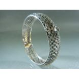 Silver (925) filigree style openwork bangle inset with CZs