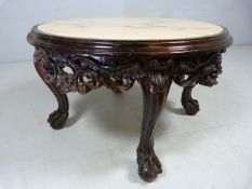 Hardwood carved coffee table with marble inset top