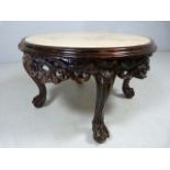 Hardwood carved coffee table with marble inset top