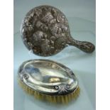 Silver backed brush and a dressing mirror A/F