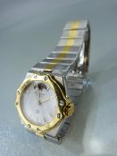 Ladies gold and steel Chopard St Moritz watch with moonfaced aperture