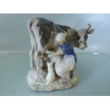 Danish Porcelain figure (Copenhagen) of a Milkmaid and Cow. Bing and Grondahl c.1900. Cow has had