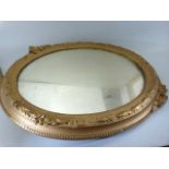 Gold painted ornate mirror