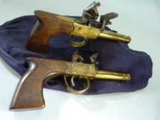 Pair of saw handle Brass action Queen Ann style continental (possibly Belgium Liege) Flintlock