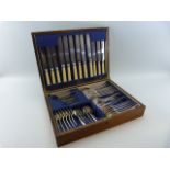 Oak cased canteen of cutlery - appears to be complete