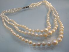 3 string graduated Cultured pearl necklace with silver Marcasite clasp. Shortest Row approx 16.