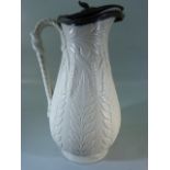 Staffordshire Saltglaze jug with lead lid. Marked WB to base