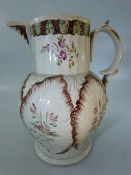 Tobacco Leaf pattern 18th Century Jug with Acanthus spout and handpainted flowers. Unmarked.