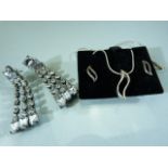 Sterling silver earring and necklace set along with a pair of paste earrings