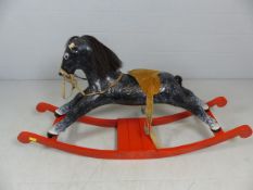 Vintage Papier mache rocking horse on red base. Missing ears