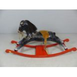 Vintage Papier mache rocking horse on red base. Missing ears