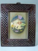Indian Mughal watercolour on an oval panel depicting an Erotic scene
