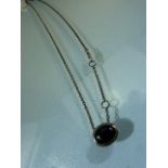 Onyx mounted on silver cabochon pendant with sterling chain