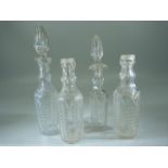 Four cut glass scent bottles