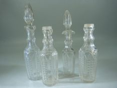 Four cut glass scent bottles