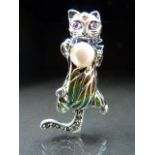 A silver Plique A Jour cat Brooch with a fresh water Pearl