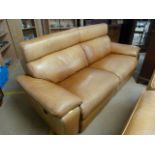 Tan leather three seater sofa with electric recliners