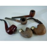 Selection of Pipes to include Two Irish silver topped pipes by Petersons.