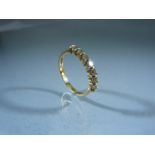 18ct Gold 7 Stone Diamond set ring Approx weight - 2.9g and Size - P