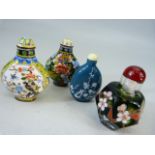 Group of four snuff bottles. Two with red character marks decorated with hand painted enamel over