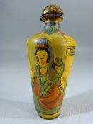 Unusual Oriental snuff bottle of enamel over metal. Tapering cylindrical body depicting a seated