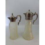 Two large Claret jugs with silver plated tops