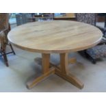 Oak circular table with matching chairs on four leg base - purchased from the Creamery