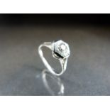 A 14ct White Gold Single stone diamond in a hexagonal setting