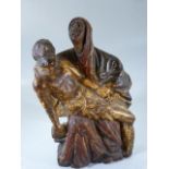 Pieta of the Virgin Mary Late 15th Century. Depicting Black Madonna carved wood and finished to both
