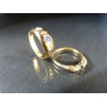 Two 18ct Rings both with missing stones. one 5 stone ring and the other a Gypsy ring. approx 4.5g