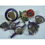 Vintage British Legion Poppy brooch along with several other brooches and cufflinks.