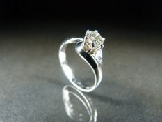 18ct White gold twisted ring set with a single Diamond of approx 0.5ct