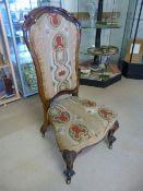 Queen Anne style Mahogany framed bedroom chair with needlework seat and back.