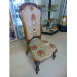 Queen Anne style Mahogany framed bedroom chair with needlework seat and back.